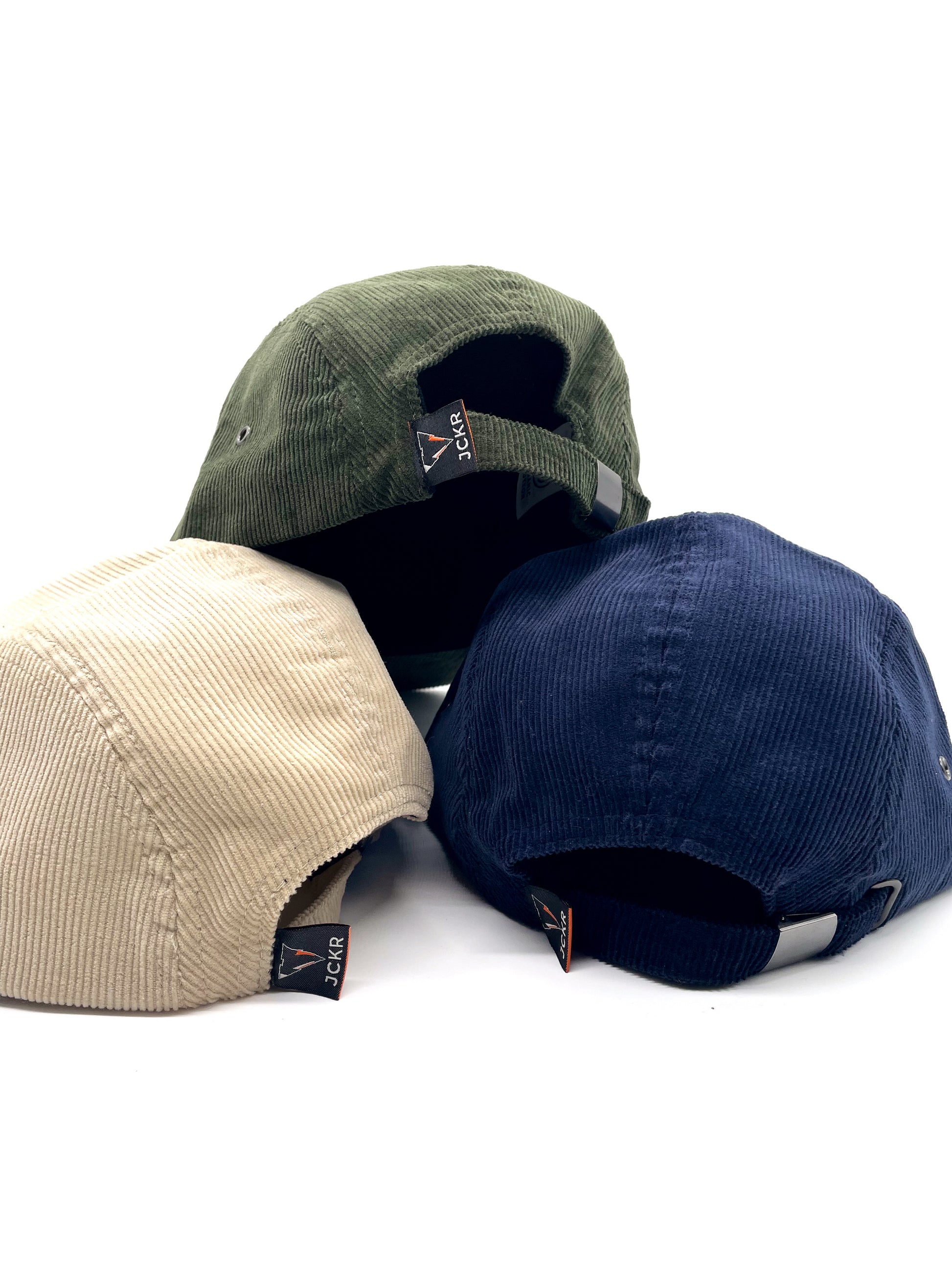 navy blue, beige and green fine corduroy 5 panels hats with JCKR logo embroidered patch on the front