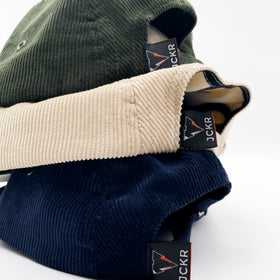 navy blue, beige and green fine corduroy 5 panels hats details with JCKR logo embroidered patch on the front and label on the back