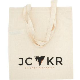 Beige tote bag with JCKR logo on a white background