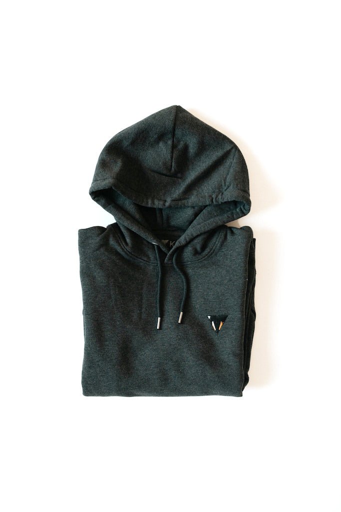 Folded dark gray organic cotton JCKR hoodie on a white background