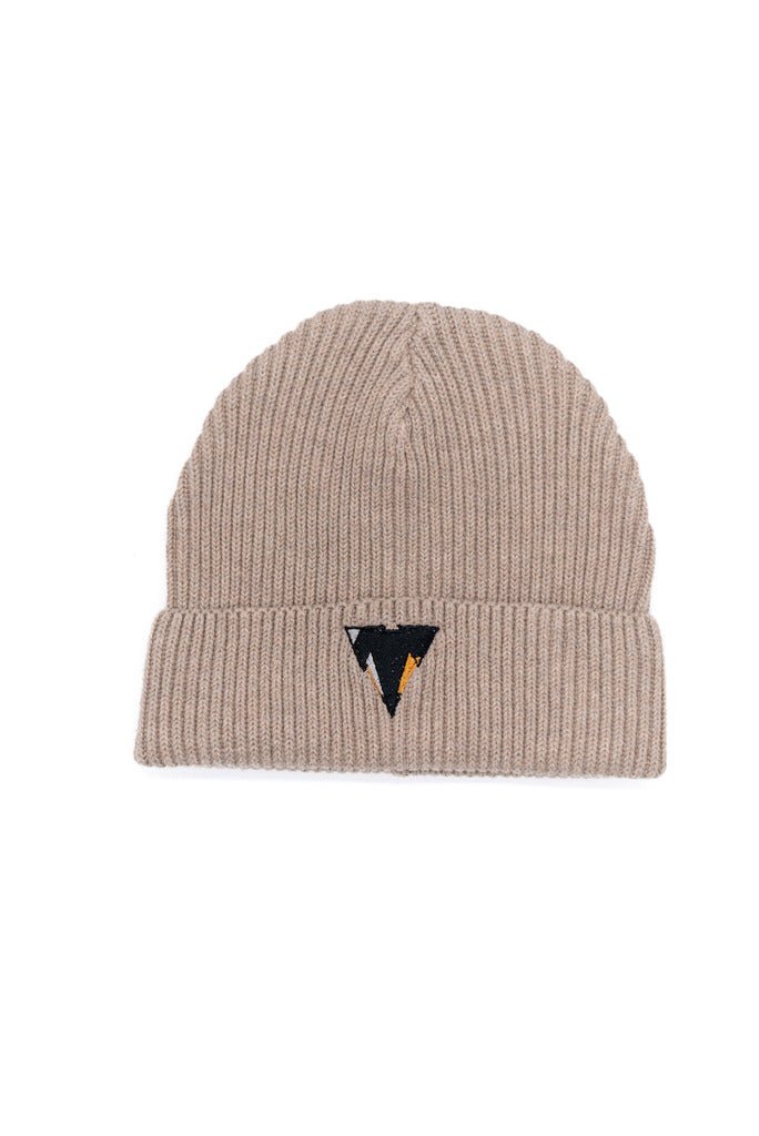 Beige knit fisherman beanie with a small embroidered JCKR logo on a white background